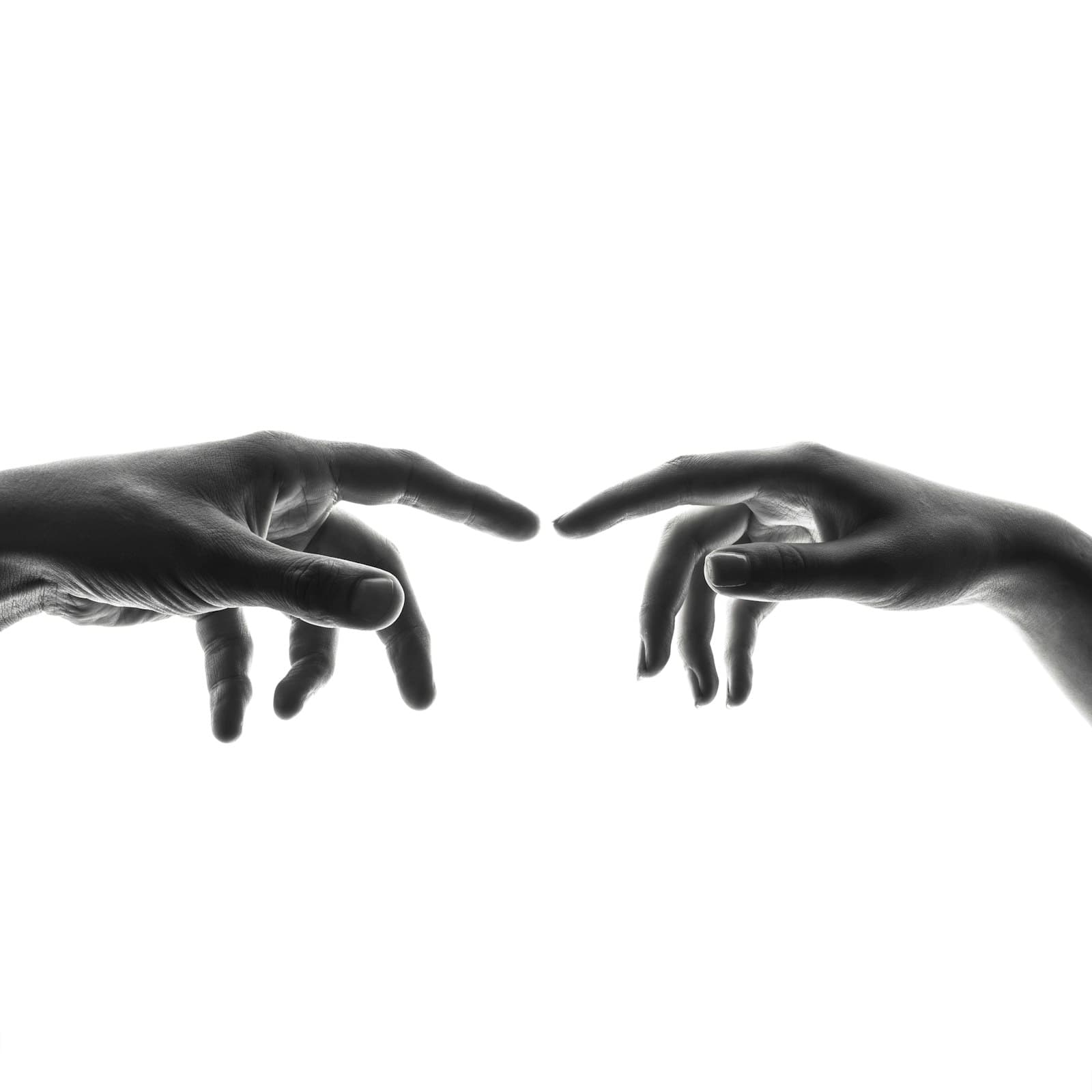 A close-up of a robotic hand reaching out
